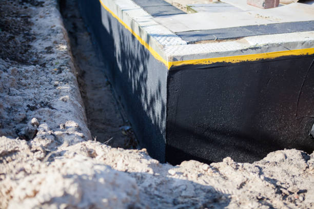 Professional Exterior Waterproofing technician working in Brigantine, NJ
